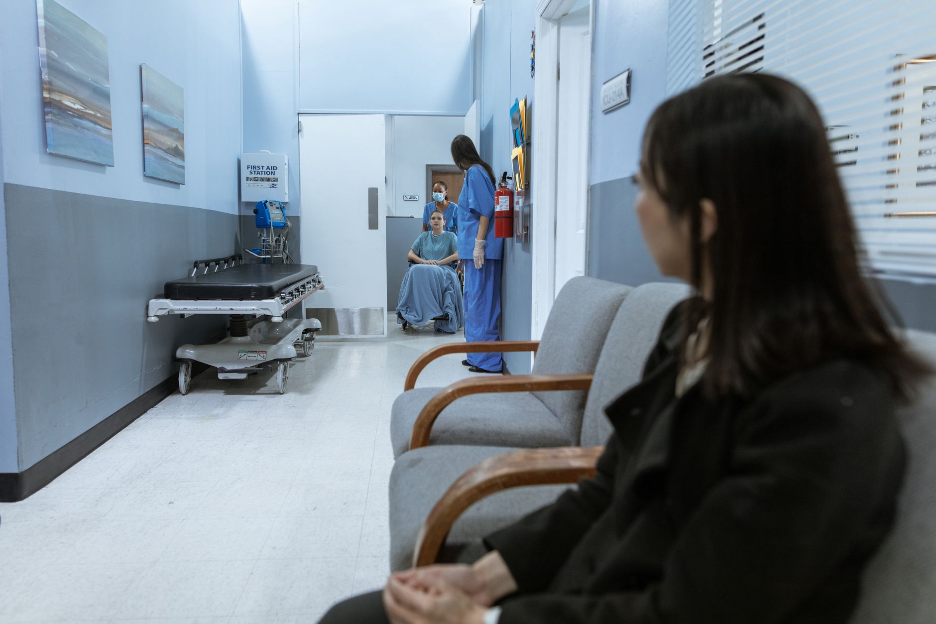 Child waiting in A&E, illustrating the pressure on emergency departments caused by CAMHS waiting list failures
