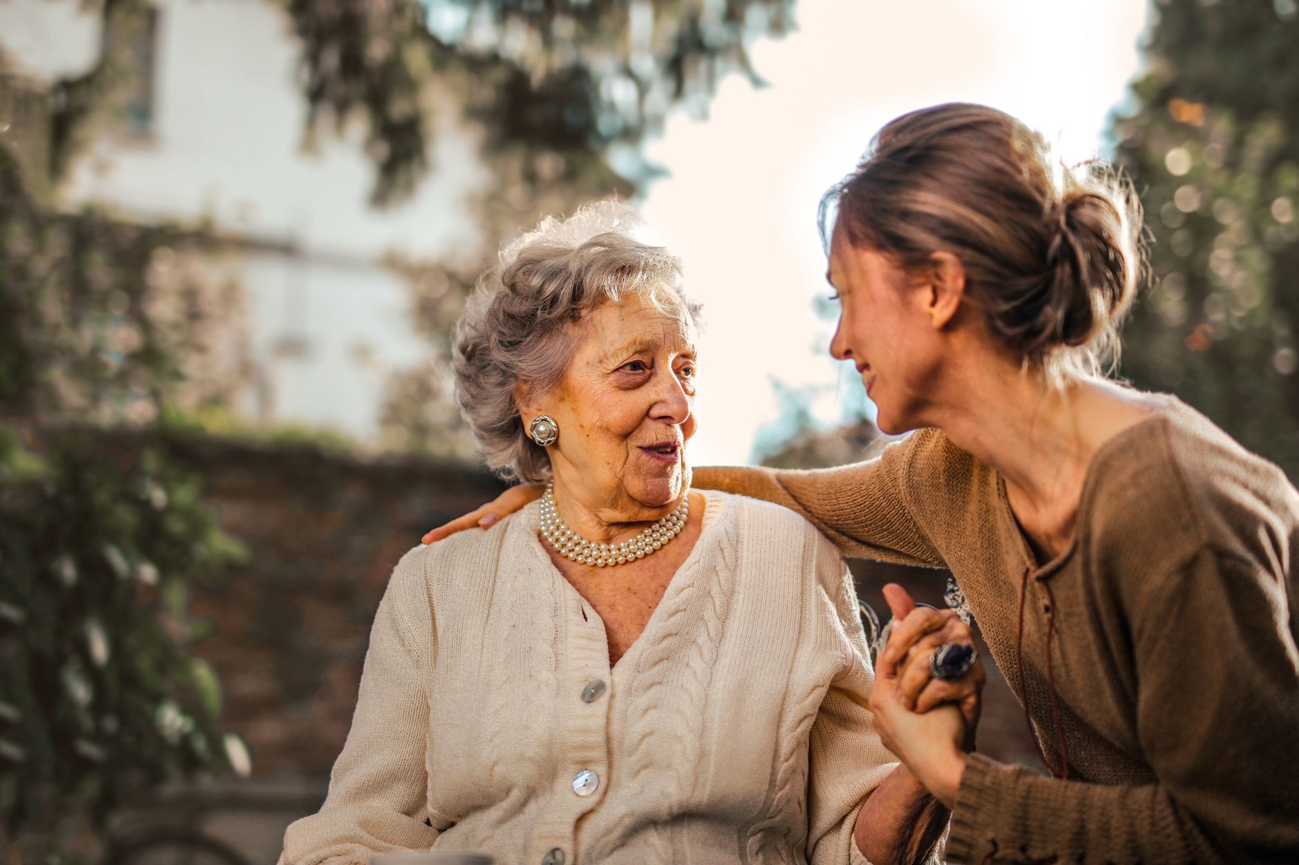 Woman providing unpaid care to elderly relative, representing unpaid carers UK workforce