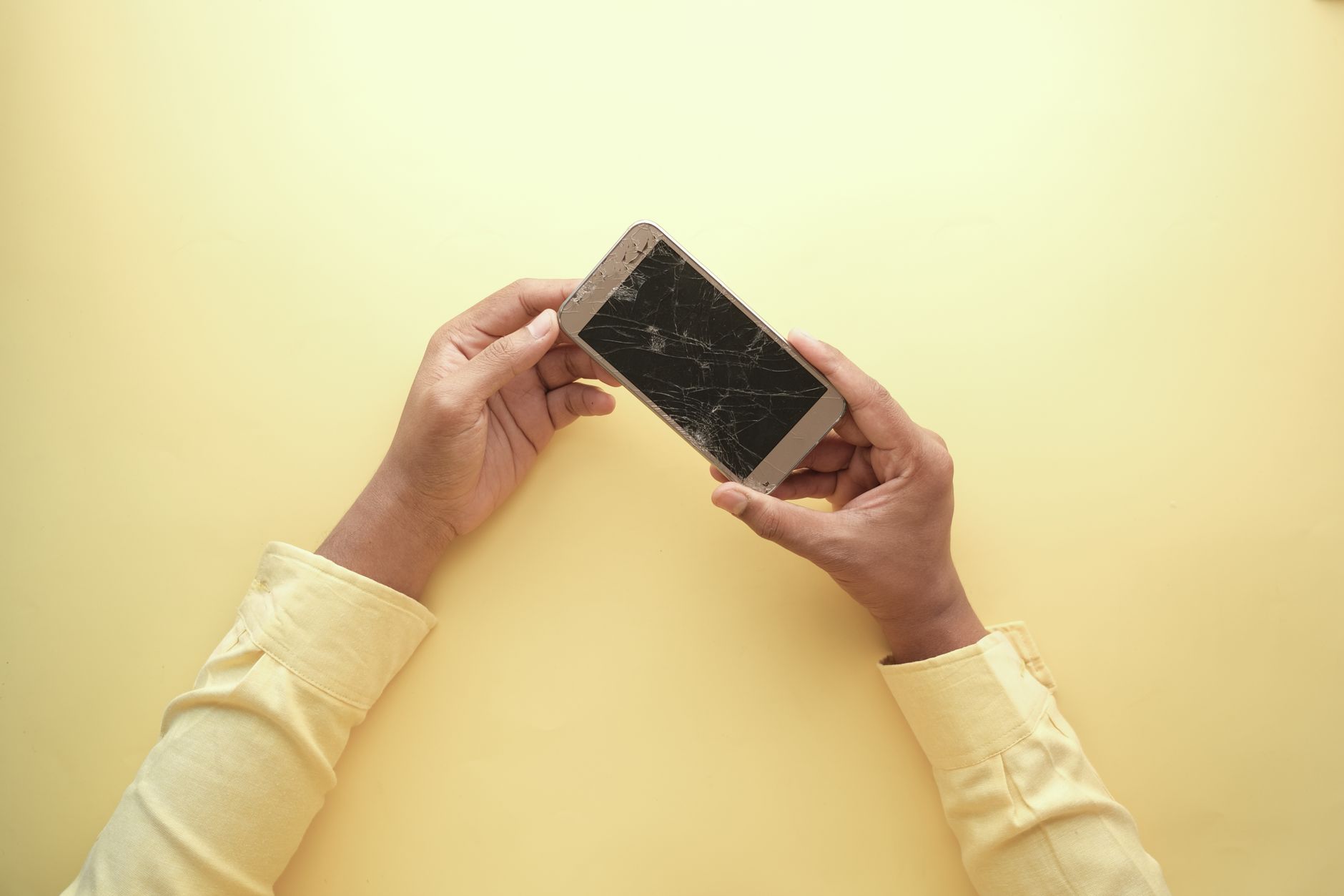 Close-up of smartphone screen being repaired, illustrating right to repair consumer electronics UK in practice