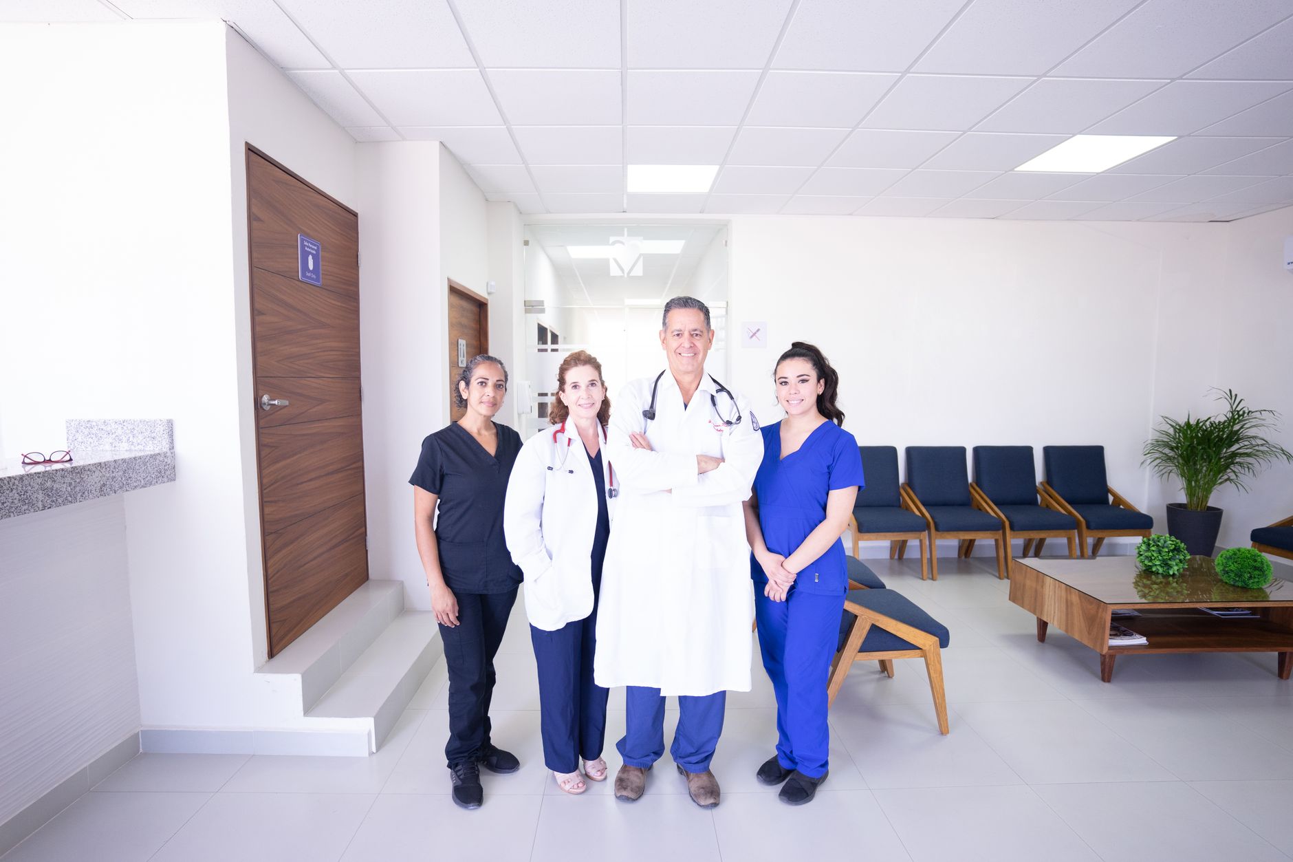 Patients waiting in an NHS outpatient department reflecting the NHS productivity crisis and long waiting times